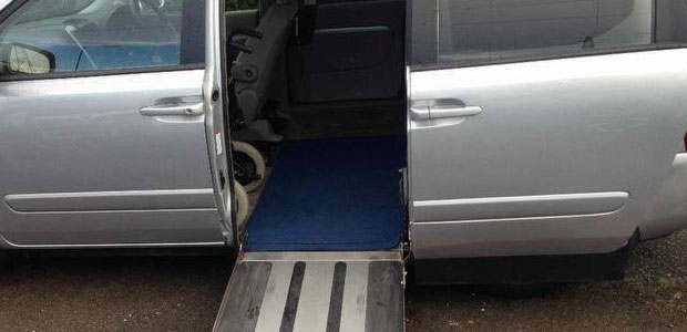 Wheelchair-accessible van with a ramp modification