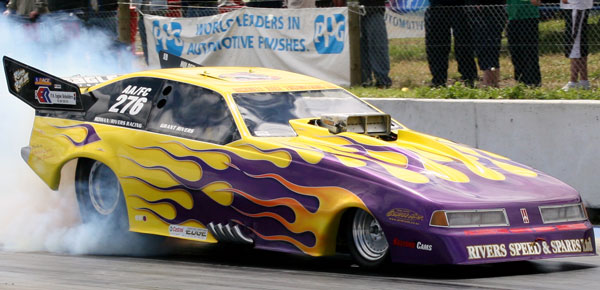 Rivers Speed & Spares funny car doing a burnout at the drag strip
